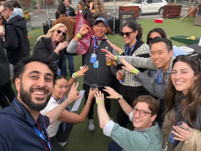 The Hottest Ones pose for a team photo at Electronic Arts’ lawn games and mini golf event in San Francisco.