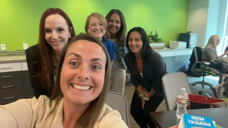 Hanger participants take a team selfie during their Austin Secret Agent event.