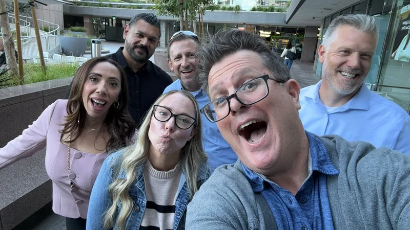 City National Bank teammates take an outdoor group selfie during their downtown Los Angeles Adventure.