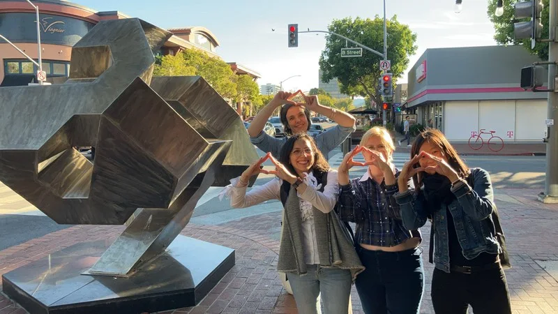 Participants pose together during the Gilead Sciences Classic Adventure event in San Mateo.